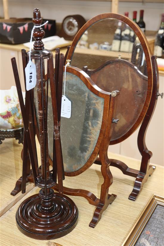 Two 19th century skeleton frame toilet mirrors and a wool winder Largest mirror H.48cm